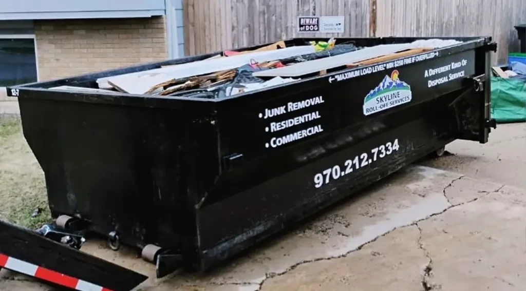 skyline roll off services dumpster rental, full, with phone number to contact business: 970-212-7334